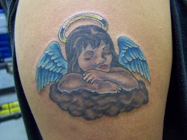 Татуировка ангел.